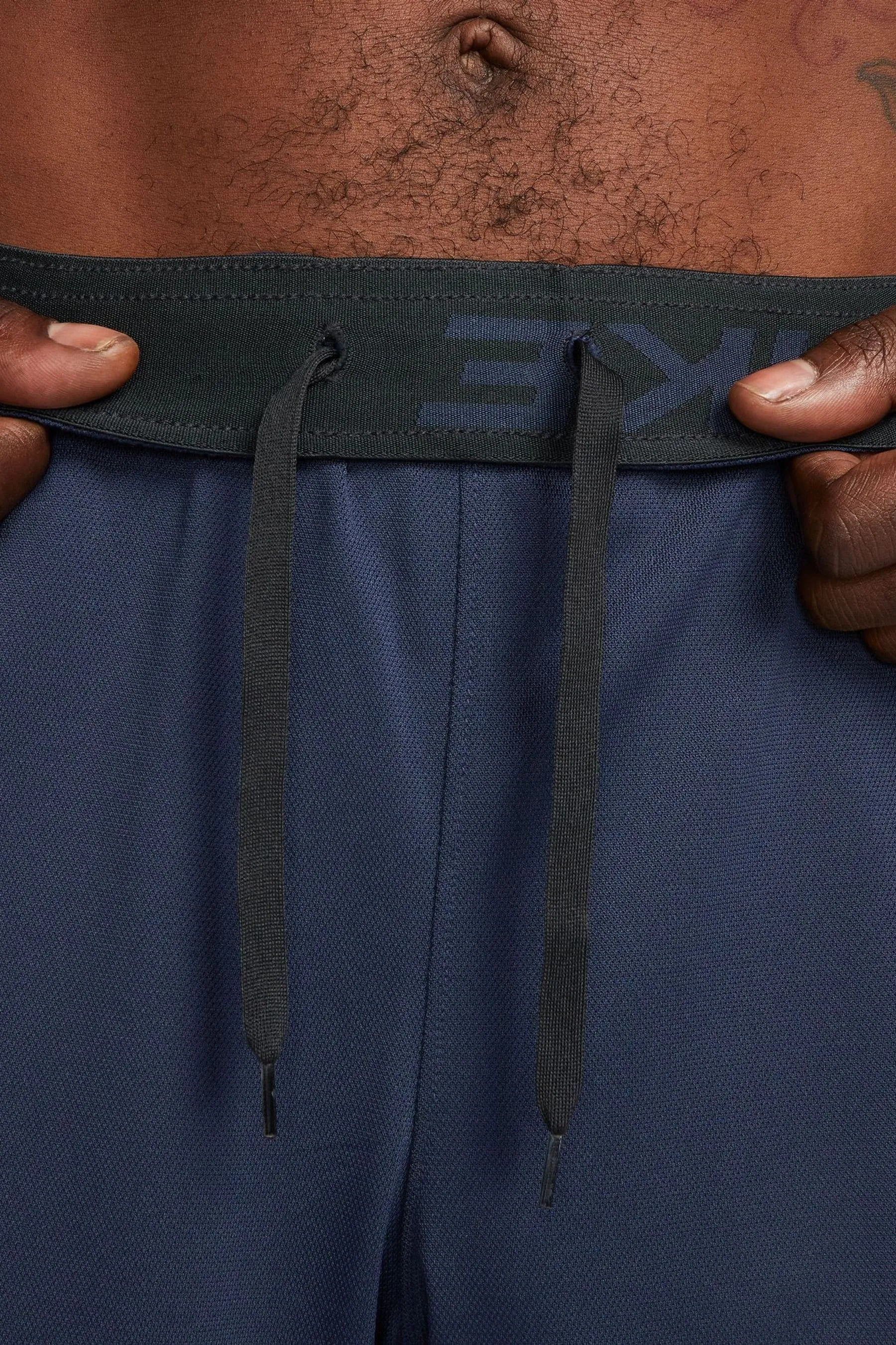 Nike Totality - Shorts versatili Dri-FIT da 9 pollici